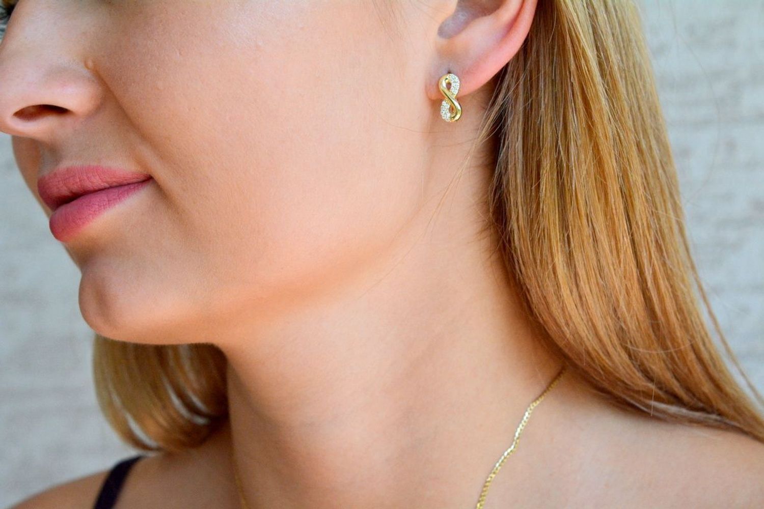 Złote kolczyki damskie 375 nieskończoność z cyrkoniami KL 8814 375.jpg